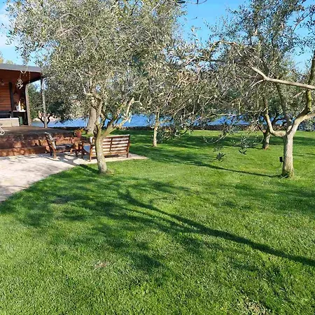 Holiday home Strandhaus Ive: Beachfront Oasis With Whirlpool And Olive Grove *